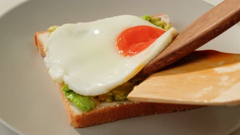 fried egg on avocado toast