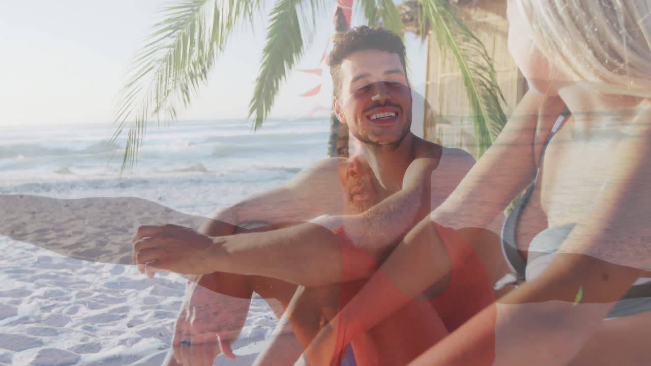 marketing team overlaying palm icon over tropical beach with ocean waves for travel campaign