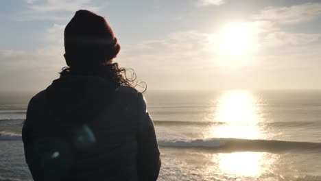 Watching-the-sunset-with-the-ocean-on-the-background