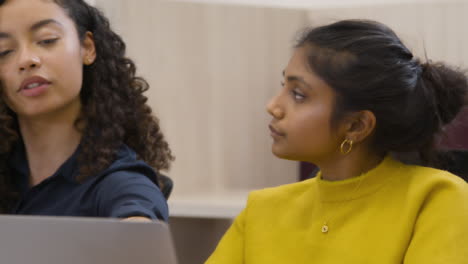 Female-Colleagues-Working-Together-In-Office