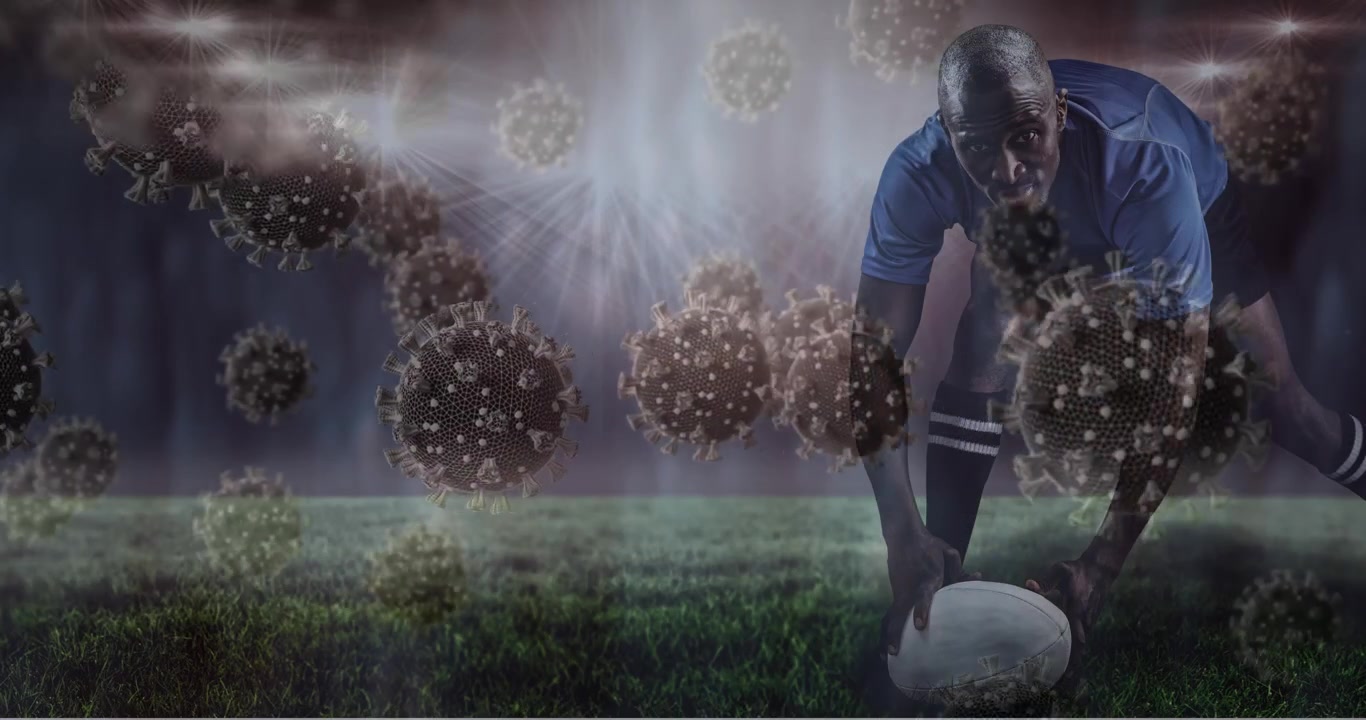 Animation af støv der svæver over en kaukasisk mand på banen på et sportsstadion.
