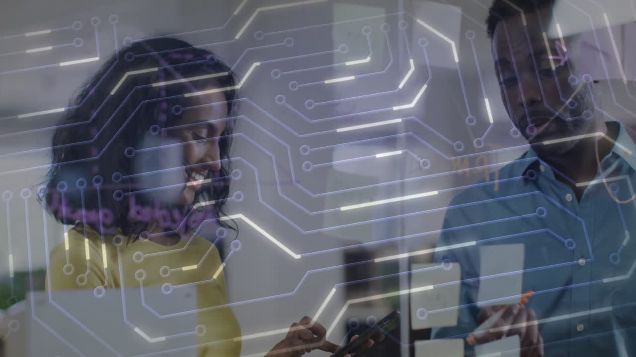 People collaborating on technology project with circuit board animation overlay