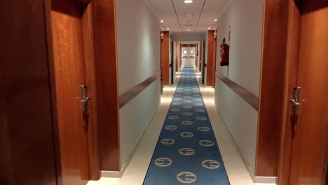 walking down hotel corridor