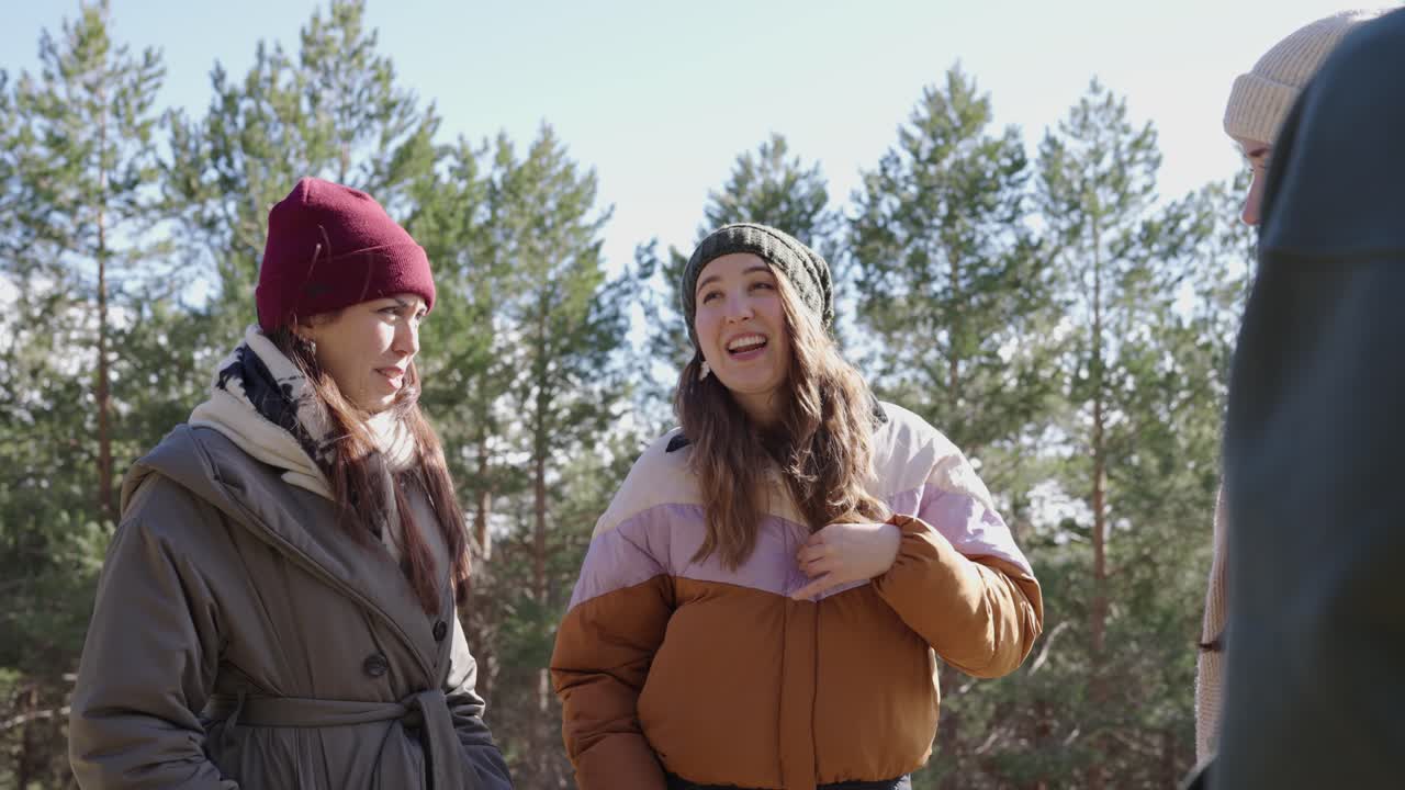 Three Women Chatting Outdoors