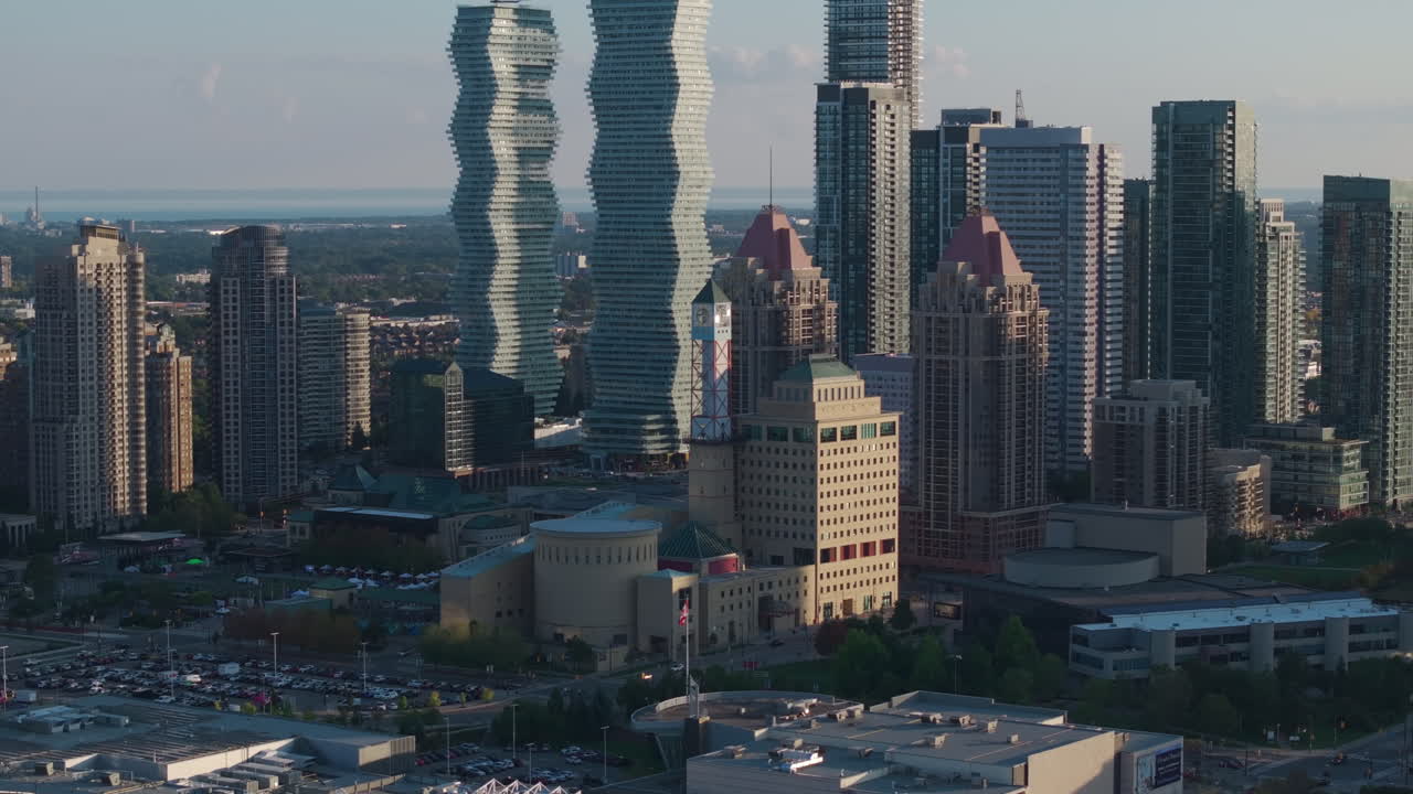 Skyline of Mississauga with iconic City Hall in evening light
