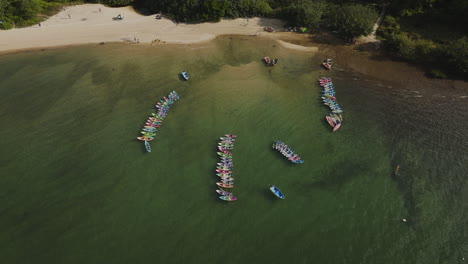 orbit drone view of traditional boats on the waters in hong kong, china