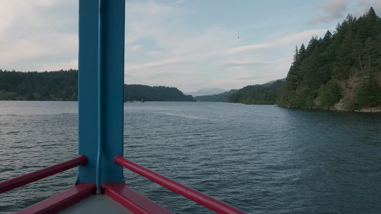 Cruise ship floating on Columbia RIver Gorge in Pacific Northwest Oregon point of view on a beautiful day slow motion