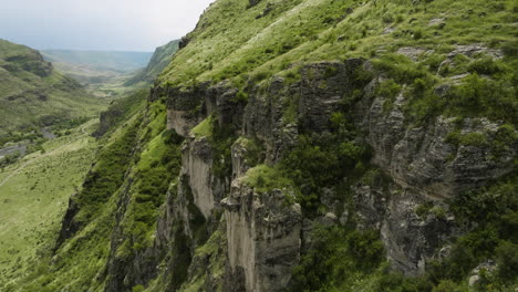 closeup aerial of rocky cliffs near khertvisi fortress in aspindza, georgia