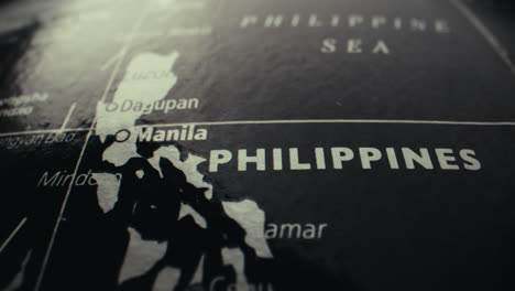 close-up of a world globe focusing on the philippines
