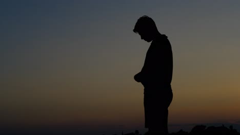 muslim man praying silhouette
