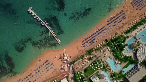 vrissiana beach protaras cyprus, sea drone shooting with clear turquoise mediterranean water