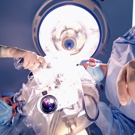 close up of neurosurgery team operating