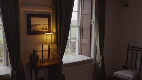 lampshade on in low light country house