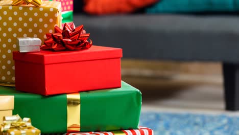 Animation-of-christmas-presents-over-blurred-background