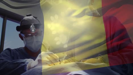 animación de la bandera de bélgica ondeando sobre los cirujanos en el quirófano