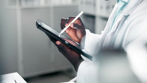 scientist using a tablet in a lab