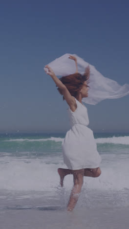 Animation-of-american-flag-over-african-american-woman-raising-hands-at-beach