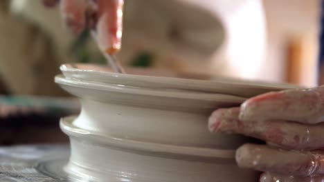 Hands-of-female-potter-making-a-pot