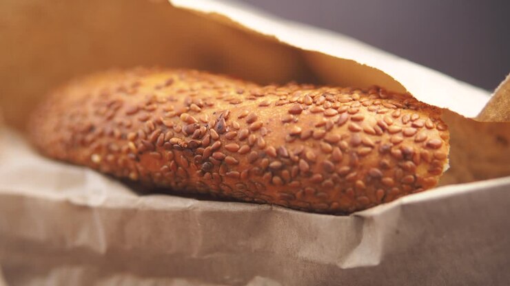 Sesame Seed Baguette in Paper Bag