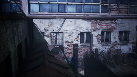 old-dark-factory-warehouse-alley-at-night