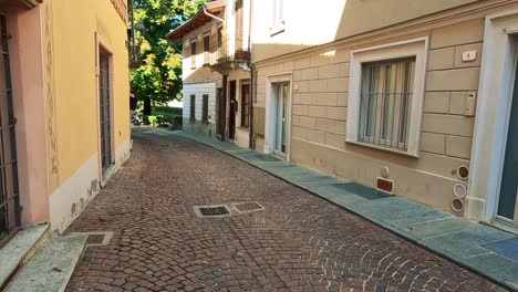 exploring a quaint cobblestone street in italy