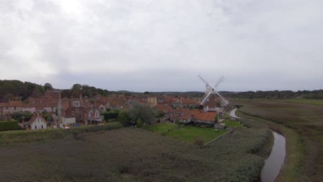 aerial drone footage of cley next to sea, and the surrounding scenery, norfolk