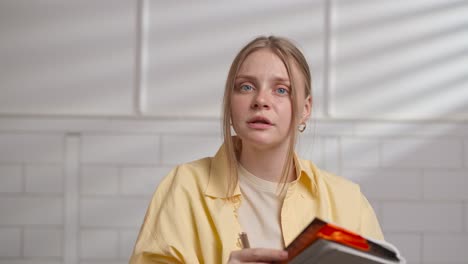 young woman writing