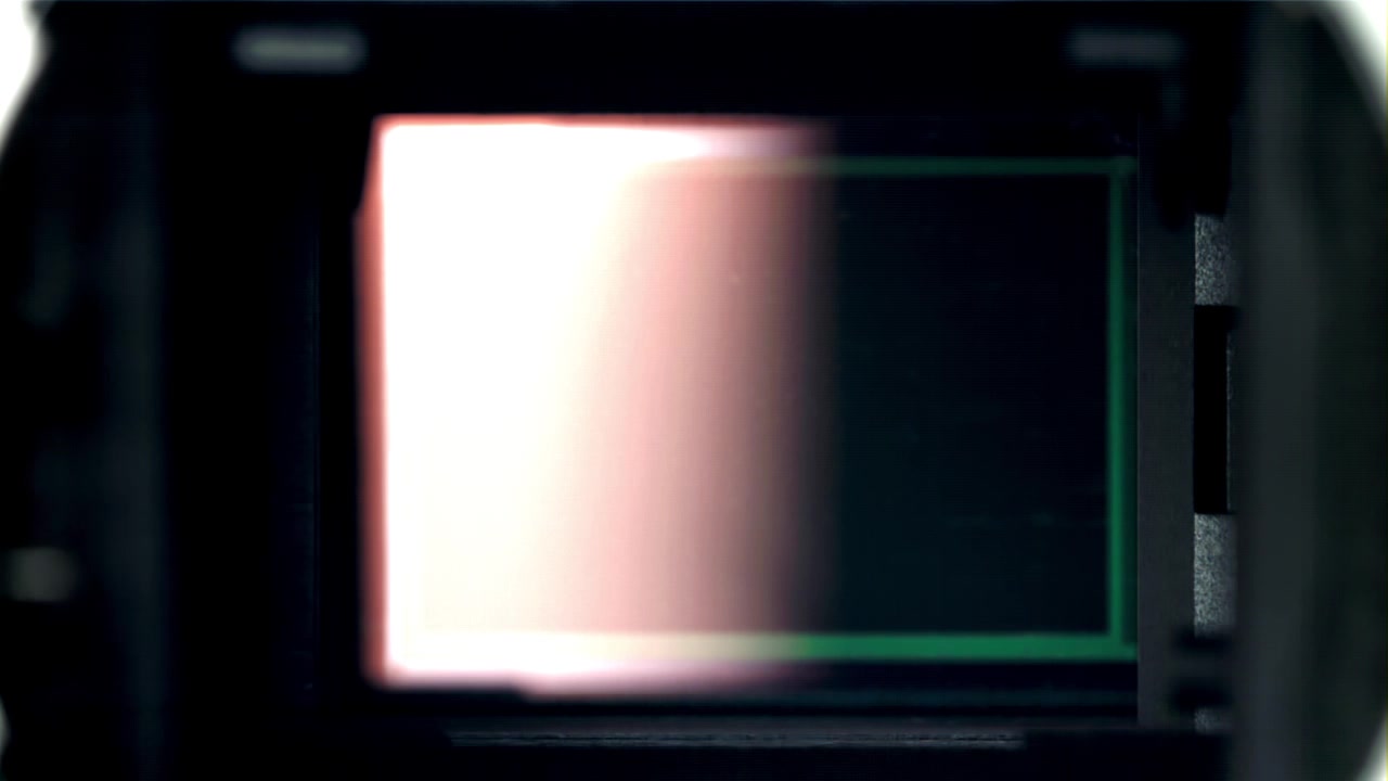 Close-up View of a Camera Shutter Opening and Closing
