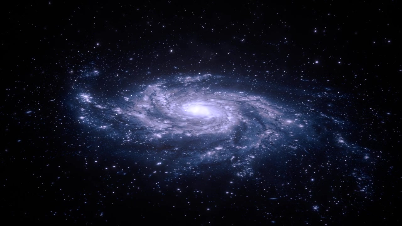 深宇宙で輝く雄大な青い渦巻銀河