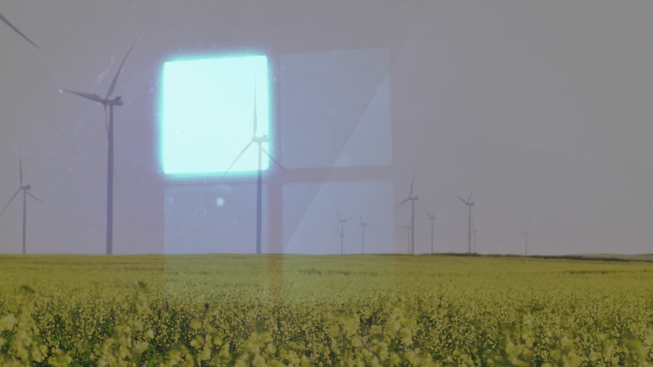 Wind turbines in field with digital window animation overlaying landscape