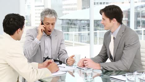 cheerful businessmen celebrating success