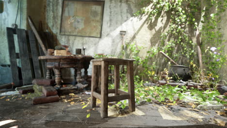 abandoned house with an old wooden stool and overgrown plants