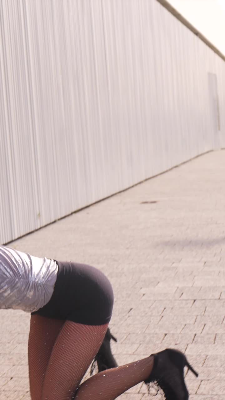 Woman Dancing in Fishnets
