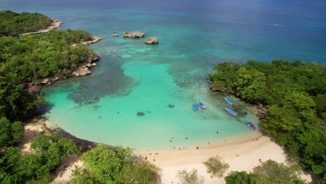 Aerial-approaching-shot-of-Playa-Caleton-with-turquoise-water