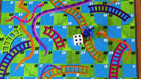 a close-up view of dice rolling and pieces moving on a vibrant snakes and ladders board.