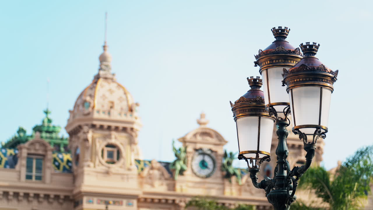 The facade of the Monte Carlo Casino with the blue sky on the background