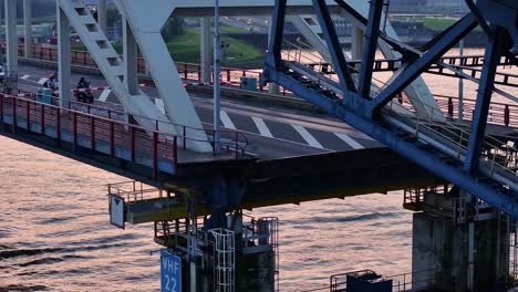 the hendrik-ido-ambacht bridge descending as traffic wait to cross, aerial