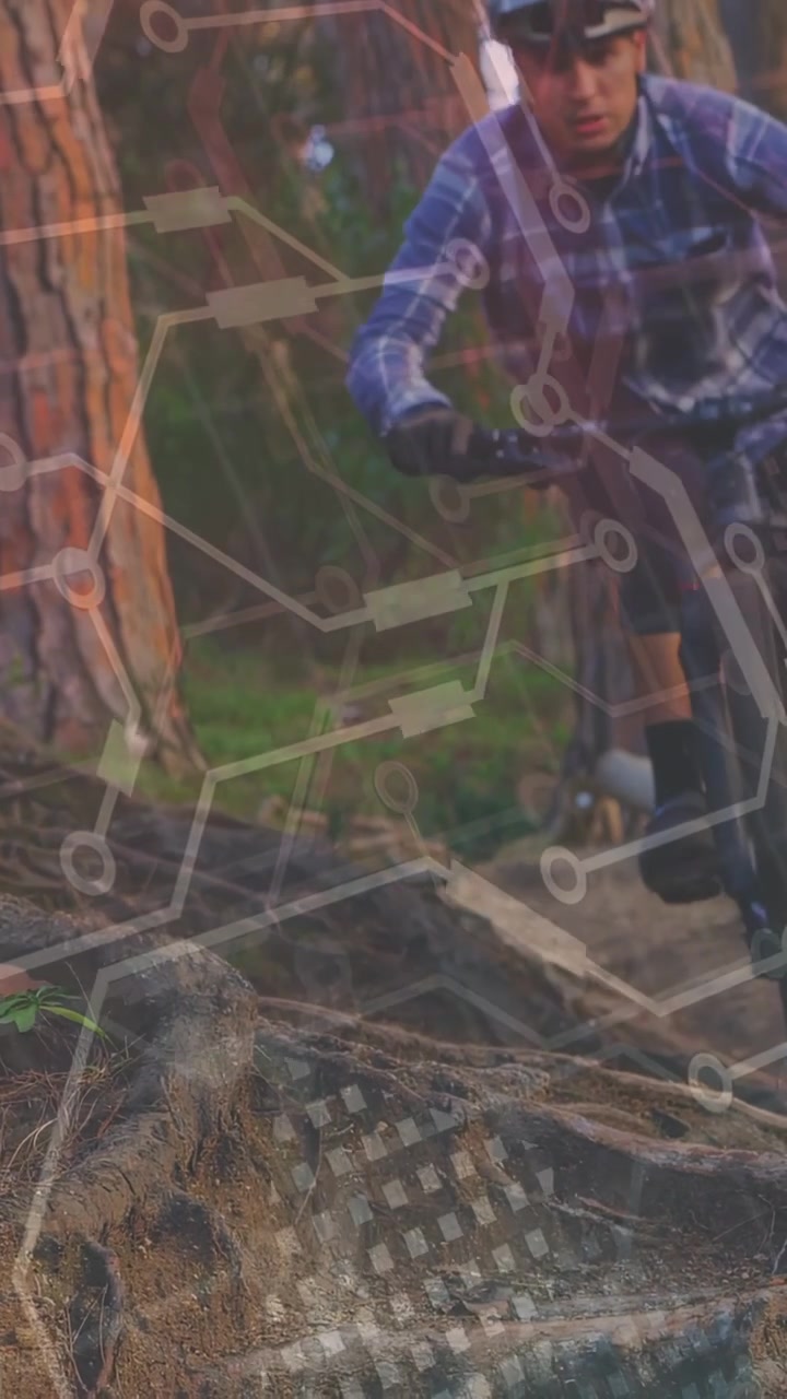 Vertical video: Rider slowing while wheel hitting root dabbing regaining balance with tech overlay