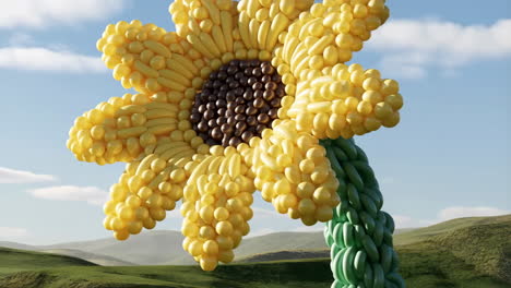 giant sunflower balloon sculpture in a field