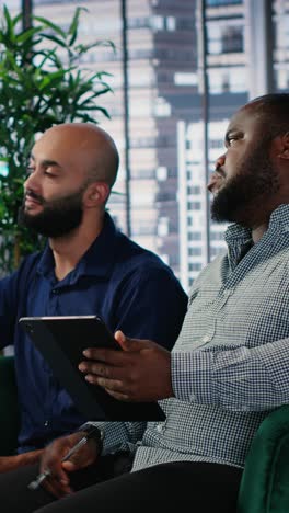 vertical video corporate leadership team in a business meeting use data driven analysis