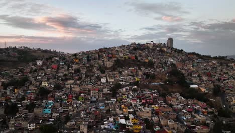 Aerial-view-around-the-ghetto-dwellings-of-Naucalpan,-vibrant-evening-in-Mexico