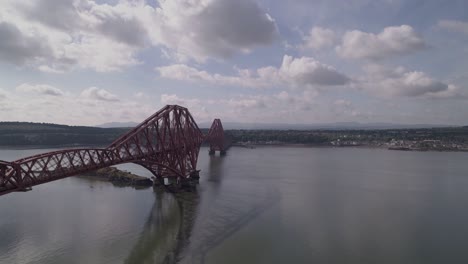 Forth-Rail-Bridge-at-track-level,-rising-up-up-from-track-level-to-above-bridge-level