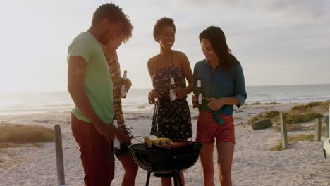 friends cooking food on barbecue at beach 4k