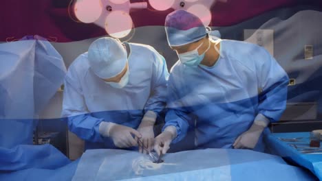 animation of flag of netherlands waving over surgeons in operating theatre