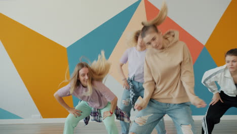 teenage girls dancing in a studio