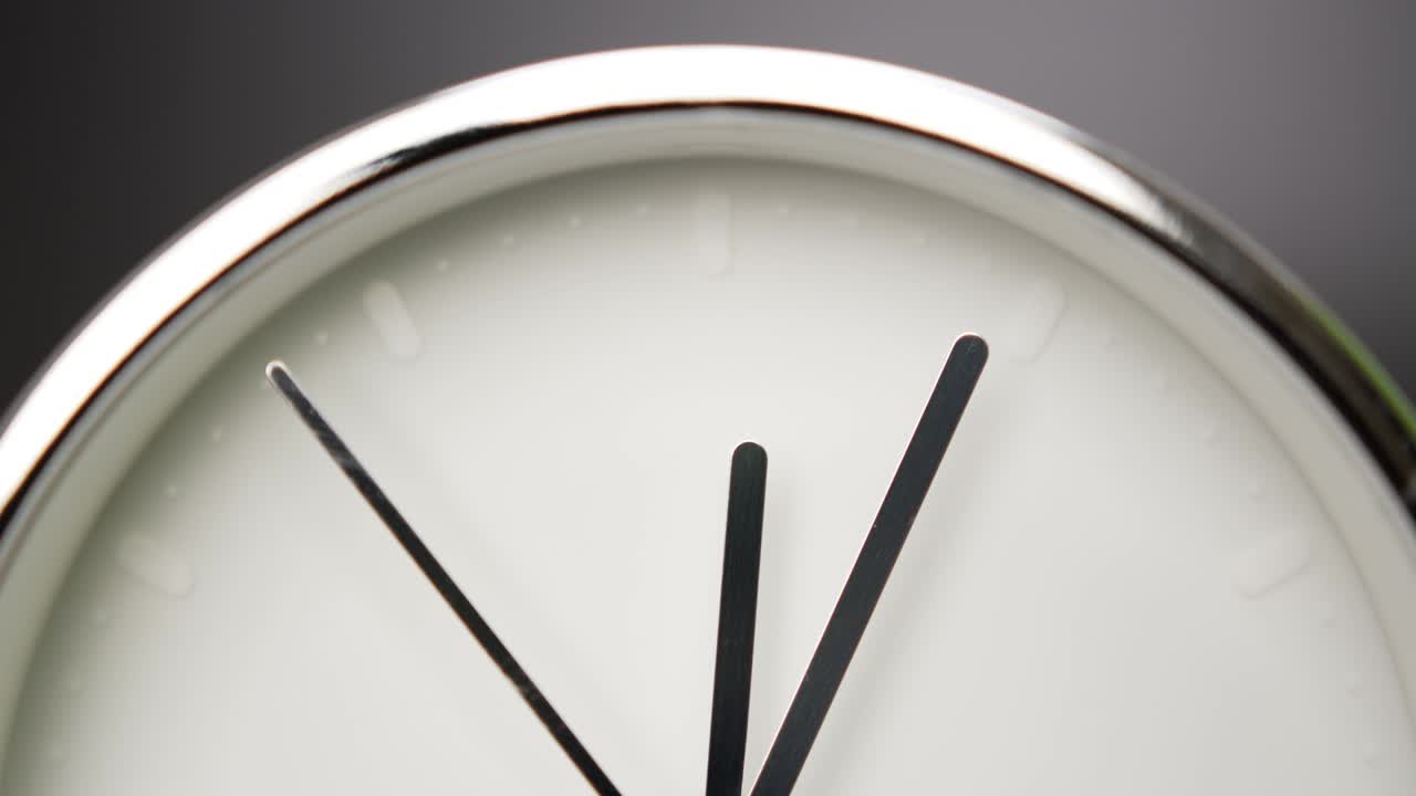 Silver Alarm clock Tell me the noontime.