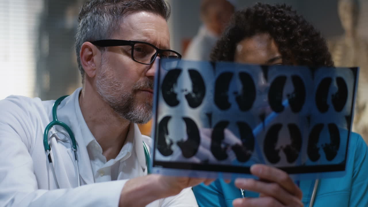 Doctors reviewing X-rays