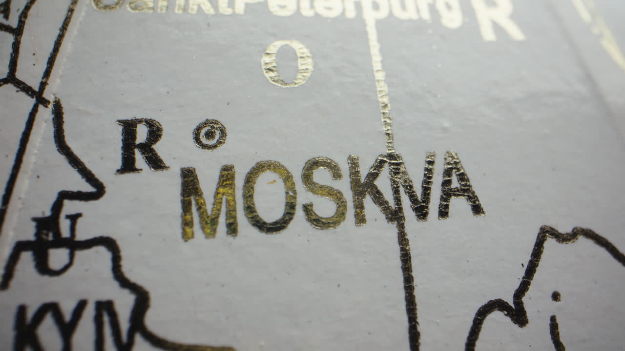 Map of Moscow, Saint Petersburg and Kyiv on Globe