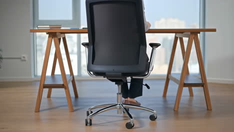 Person working at a desk in a modern office