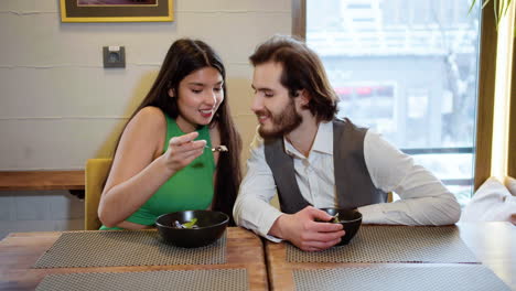 Happy-couple-taking-photo-on-a-date